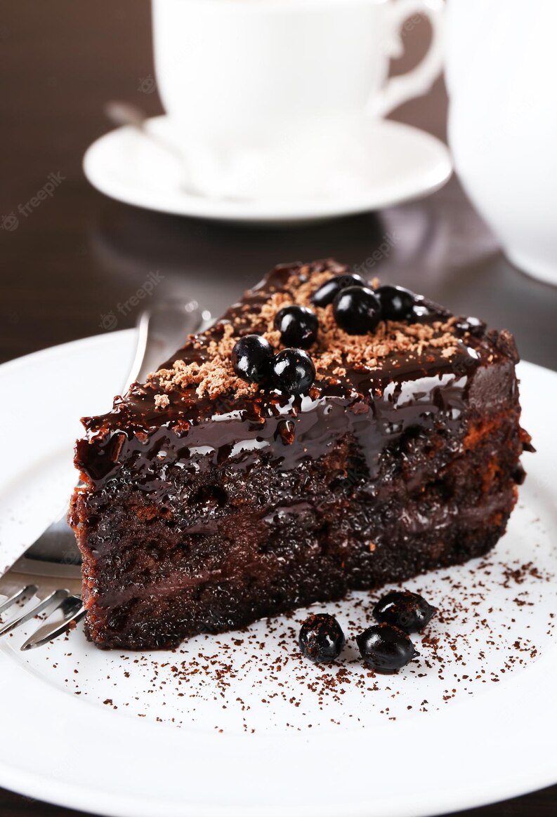 20230622200553_[fpdl.in]_delicioso-pastel-chocolate-servido-primer-plano-mesa_392895-192726_medium